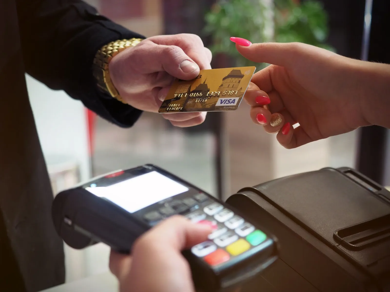 Person updating direct deposit and automatic payments while switching to a new bank