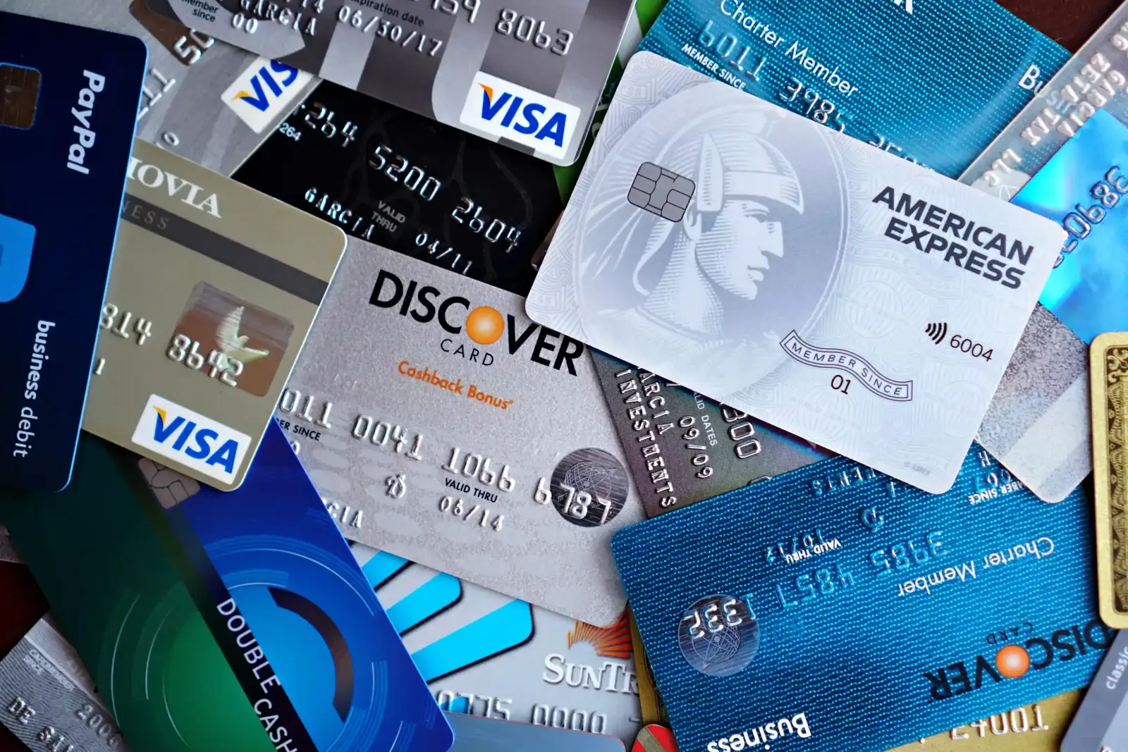 Three-way comparison of a traditional bank branch, credit union, and online bank app