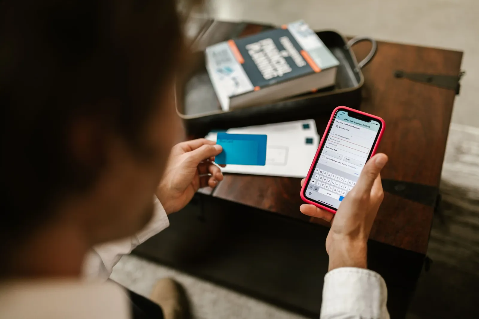Side by side comparison of a checking account and savings account on a phone