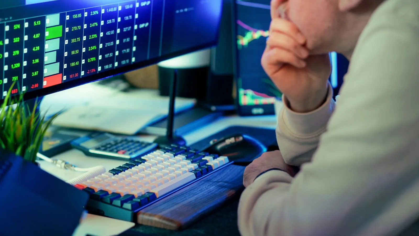 Beginner investor researching a company before buying their first stock