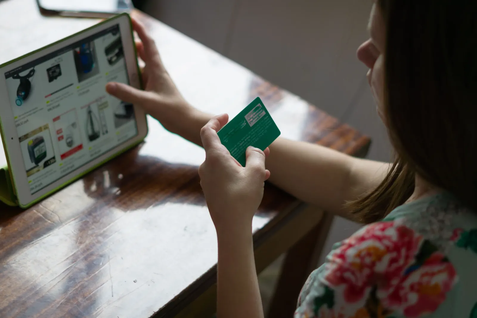 Person using a banking app with biometric login and budgeting features on a phone